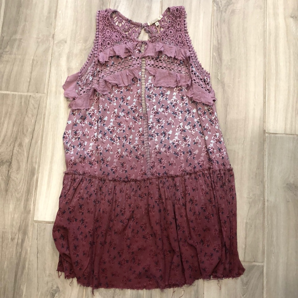 Gimmicks sleeveless ruffled tunic